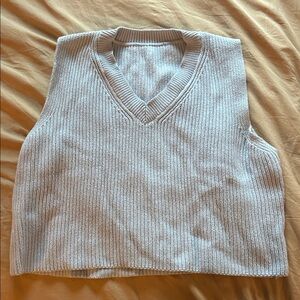 Cropped light blue sweater vest